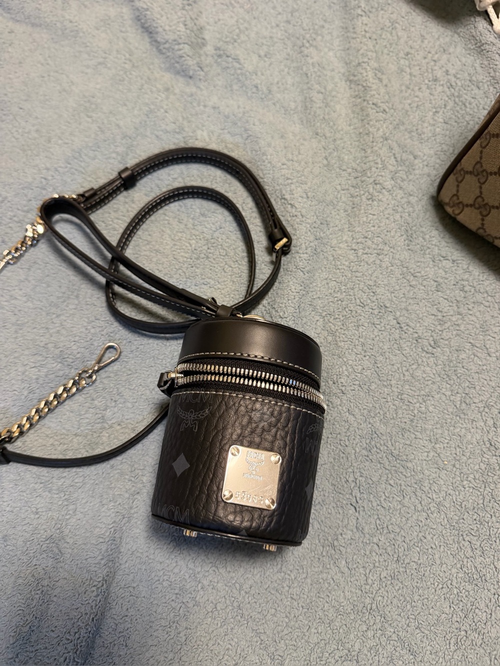 MCM Black Pebbled Leather Cylinder Crossbody with Silver Plaque